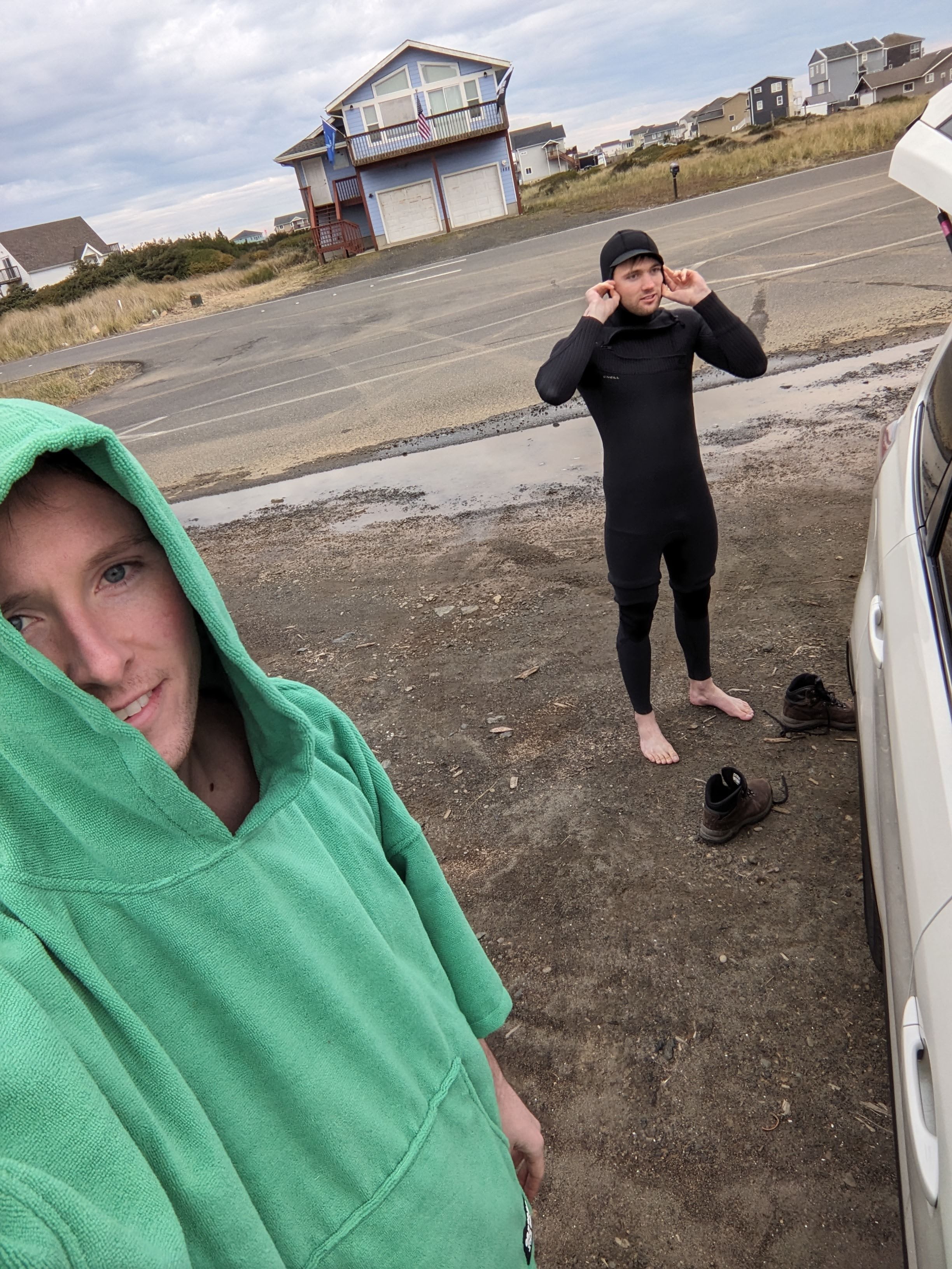 Tim and I surfing on the Washington coast